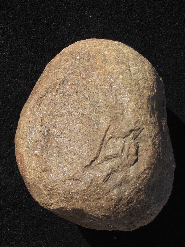 River-washed sandstone boulder.